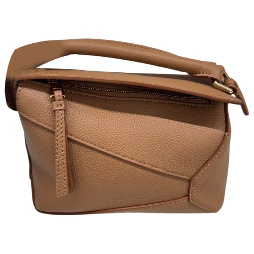 Puzzle leather handbag