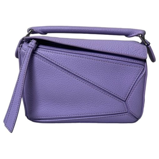 Puzzle leather handbag