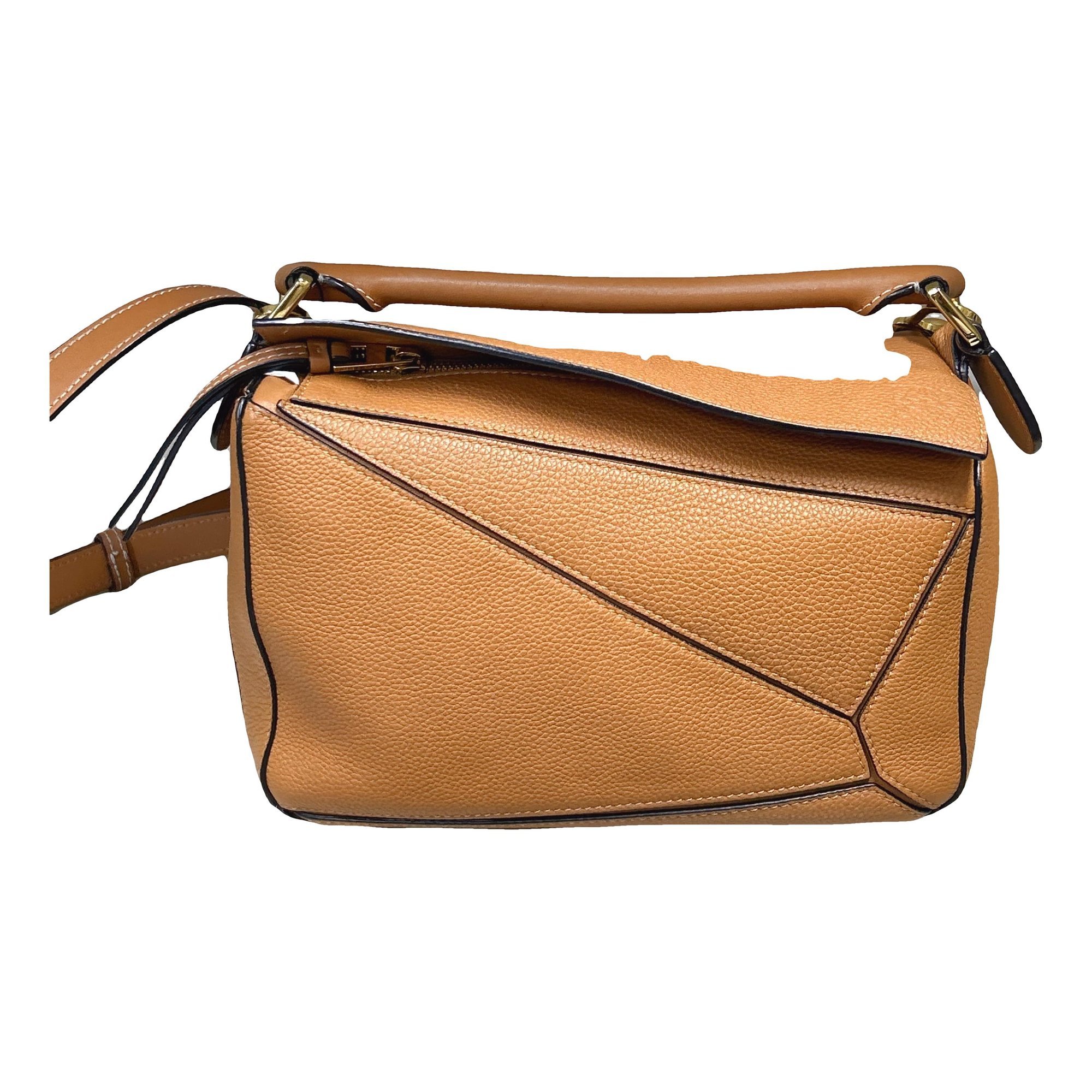 Puzzle leather handbag