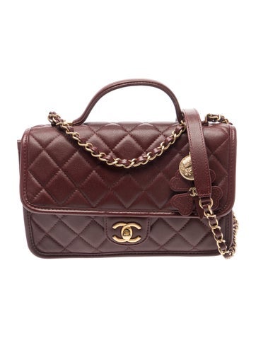 Quilted Flap Handle Bag