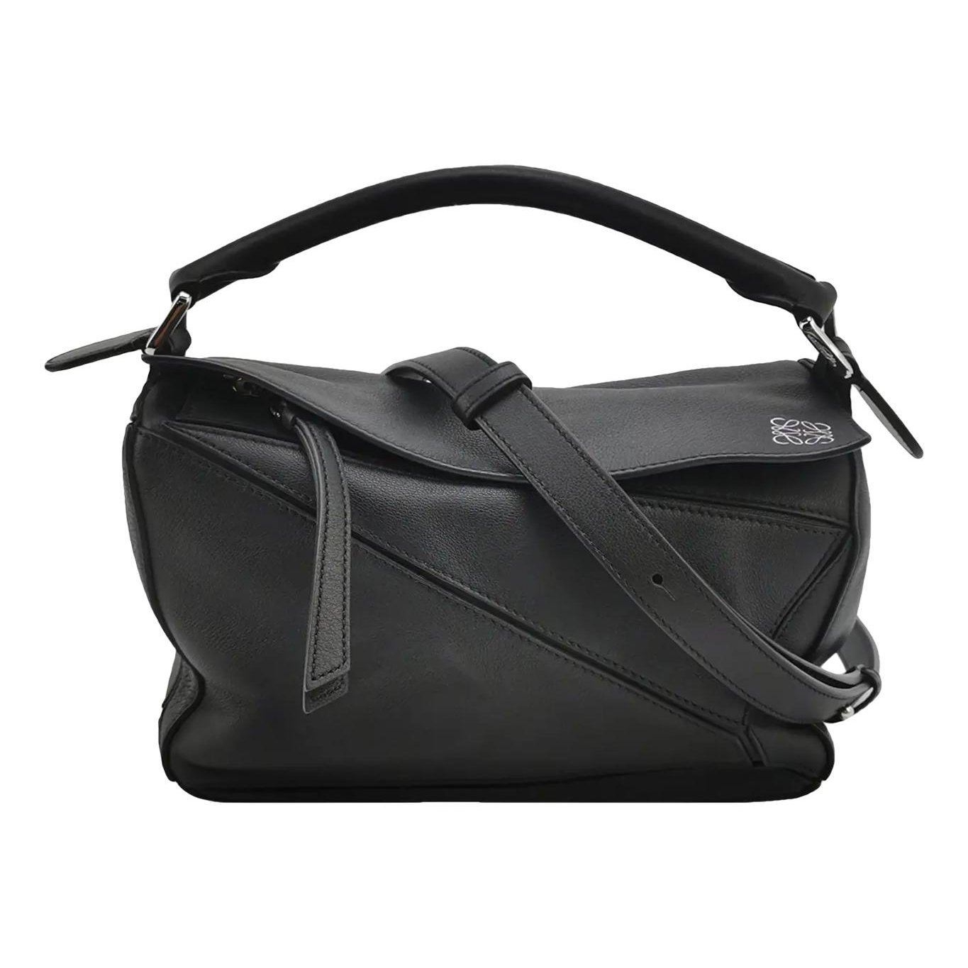 Puzzle leather handbag