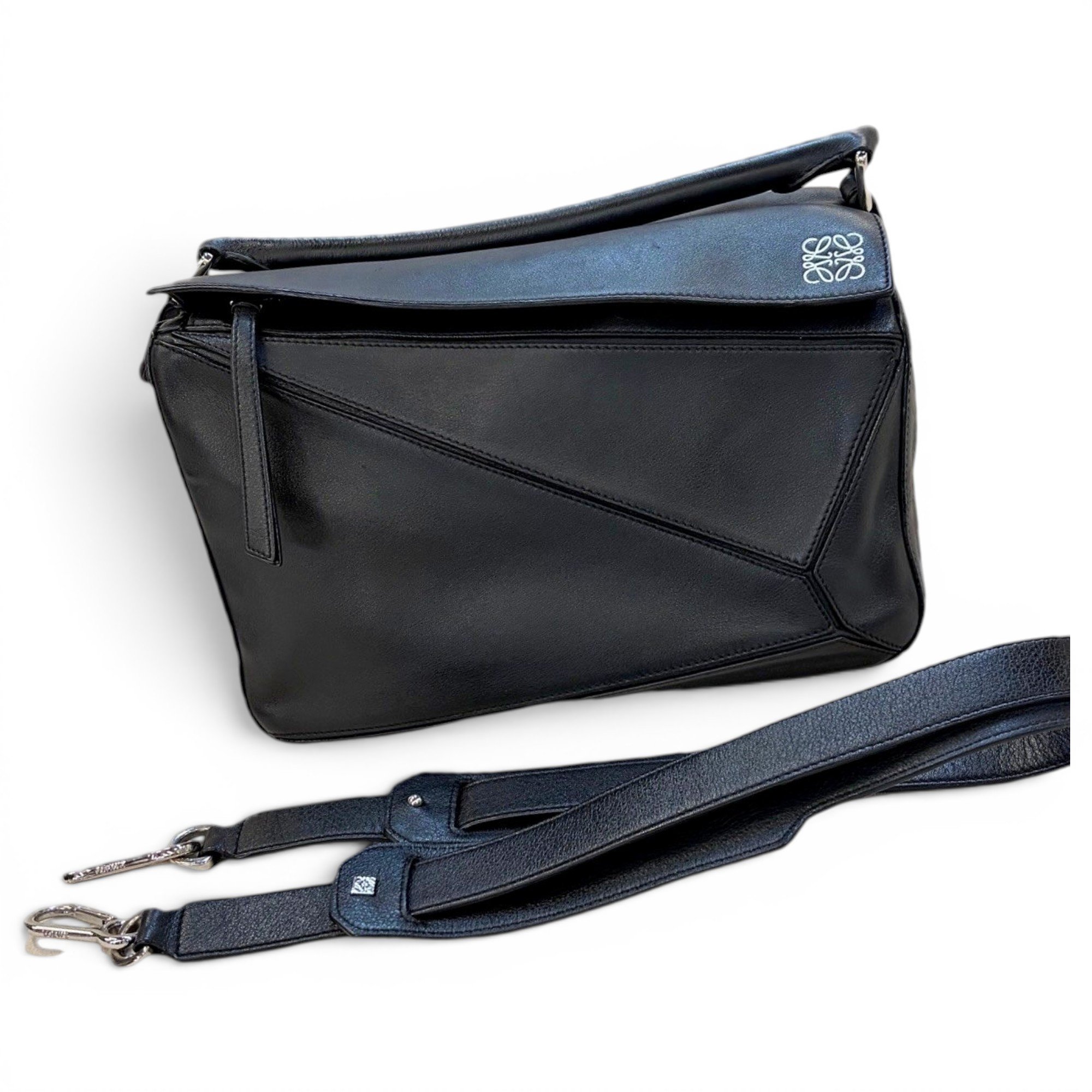 Puzzle leather handbag
