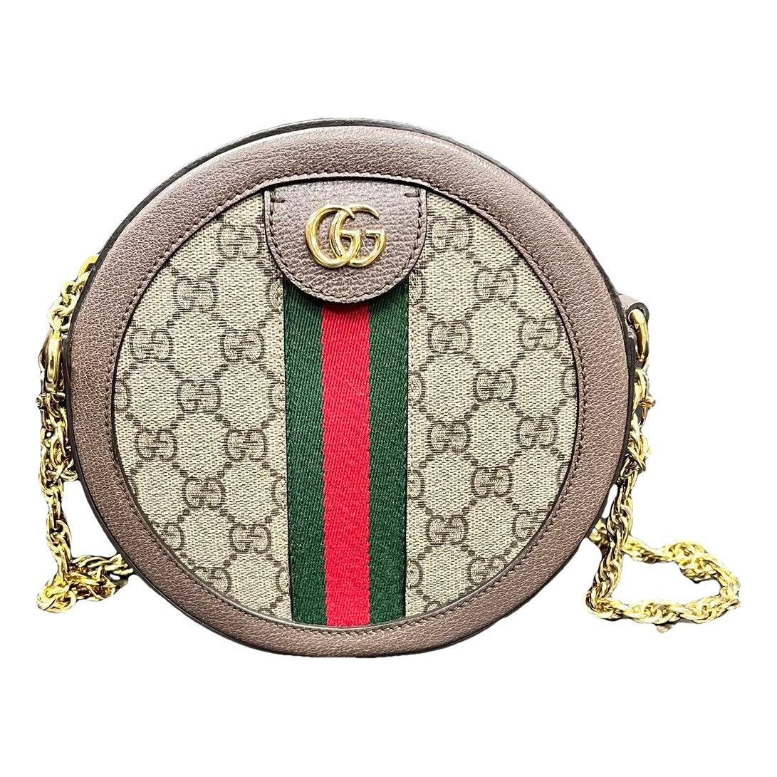 Ophidia Round vinyl crossbody bag