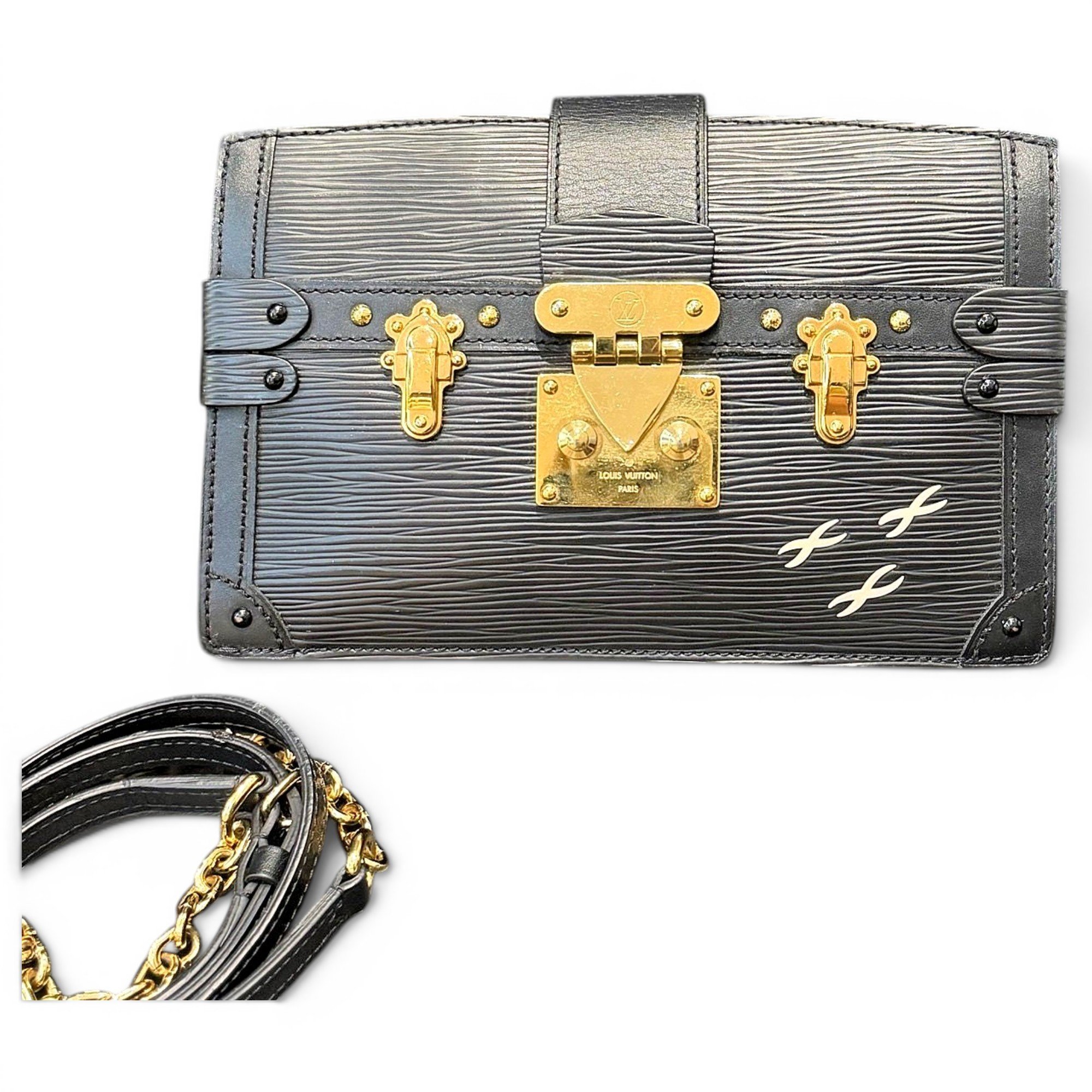 Pochette Trunk leather handbag