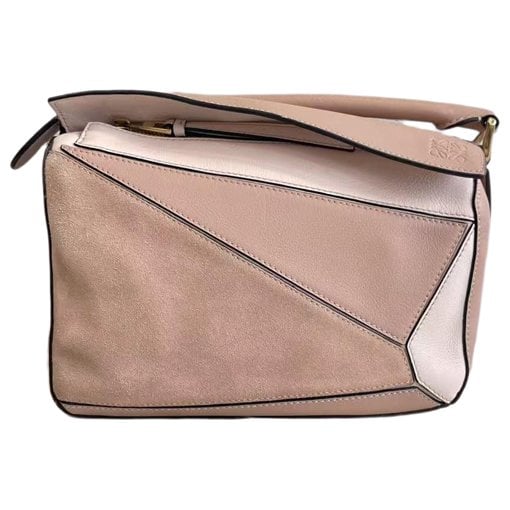 Puzzle leather handbag