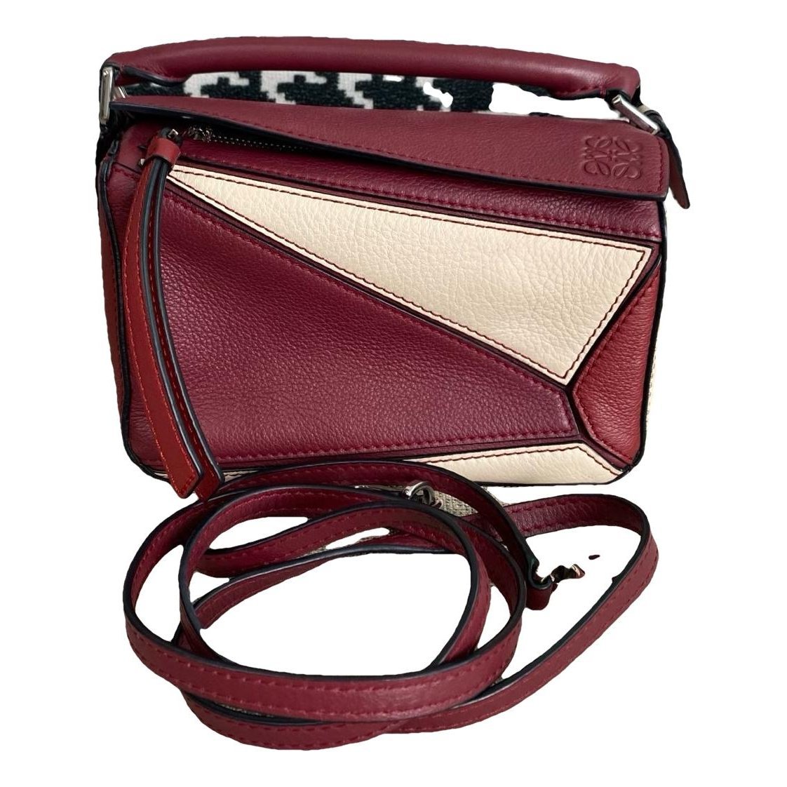 Puzzle leather handbag