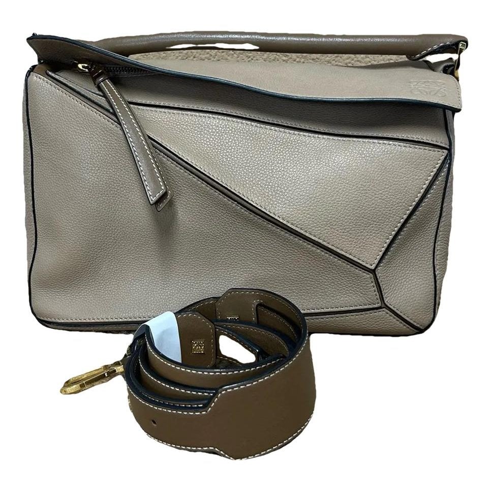Puzzle leather handbag