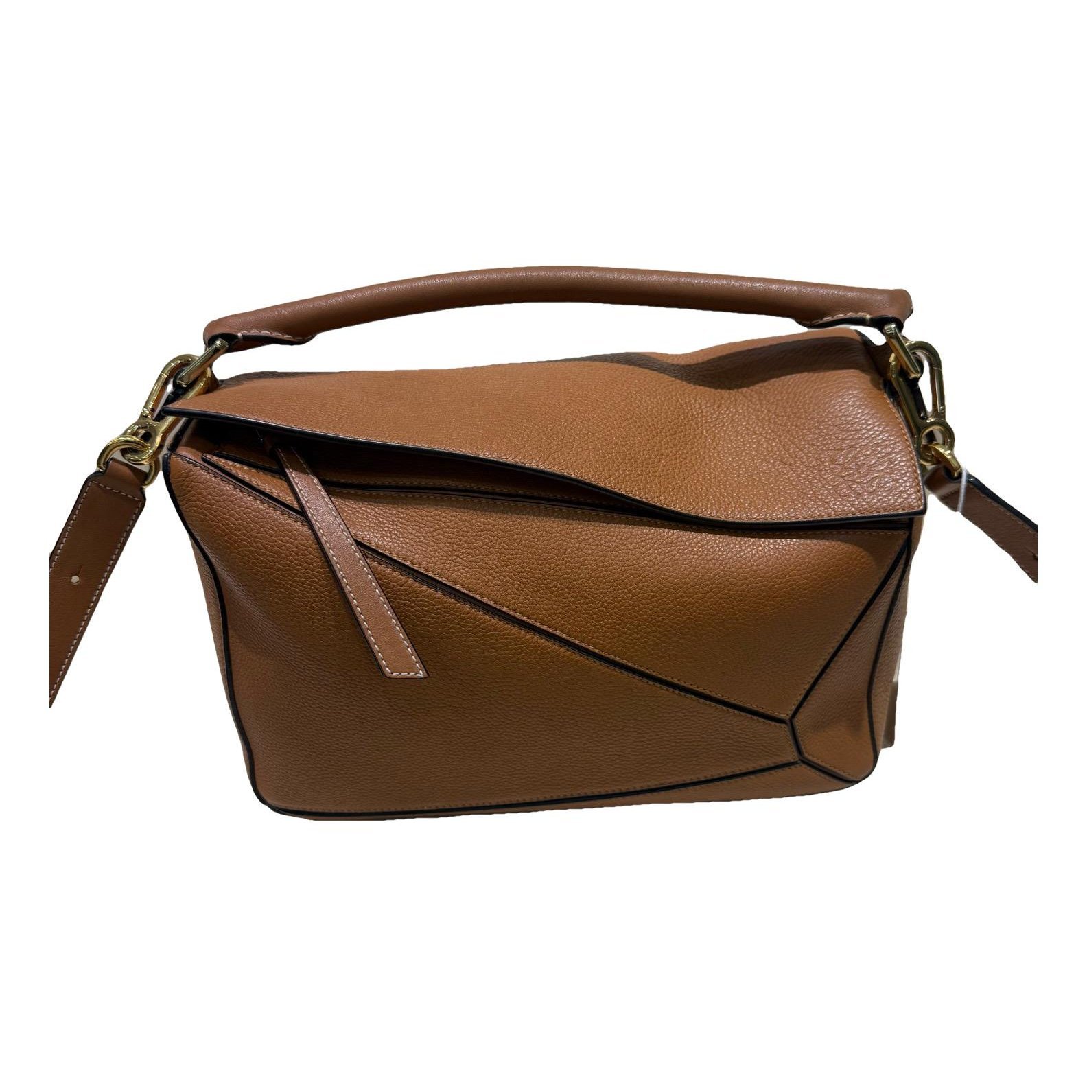 Puzzle leather handbag