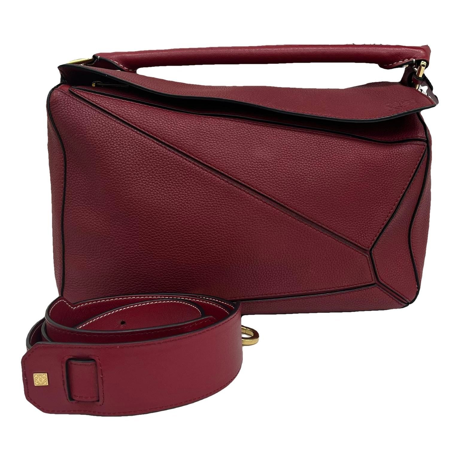 Puzzle leather handbag