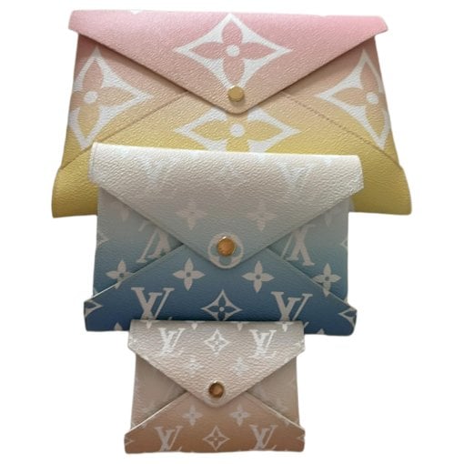 Kirigami leather clutch bag