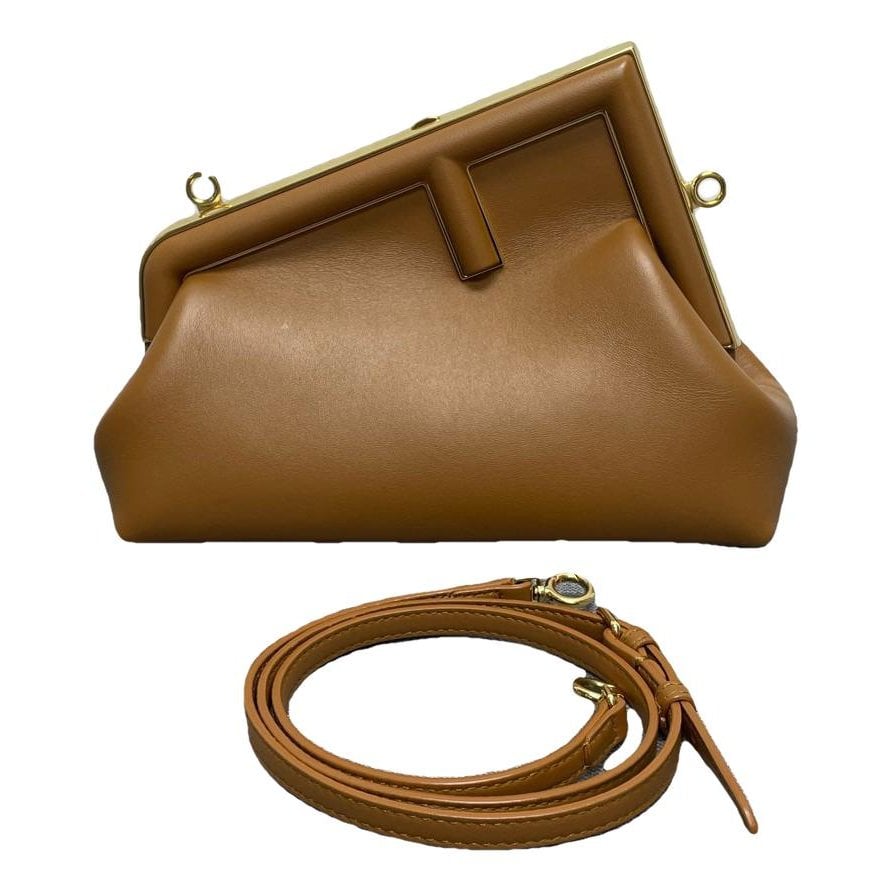 First leather crossbody bag