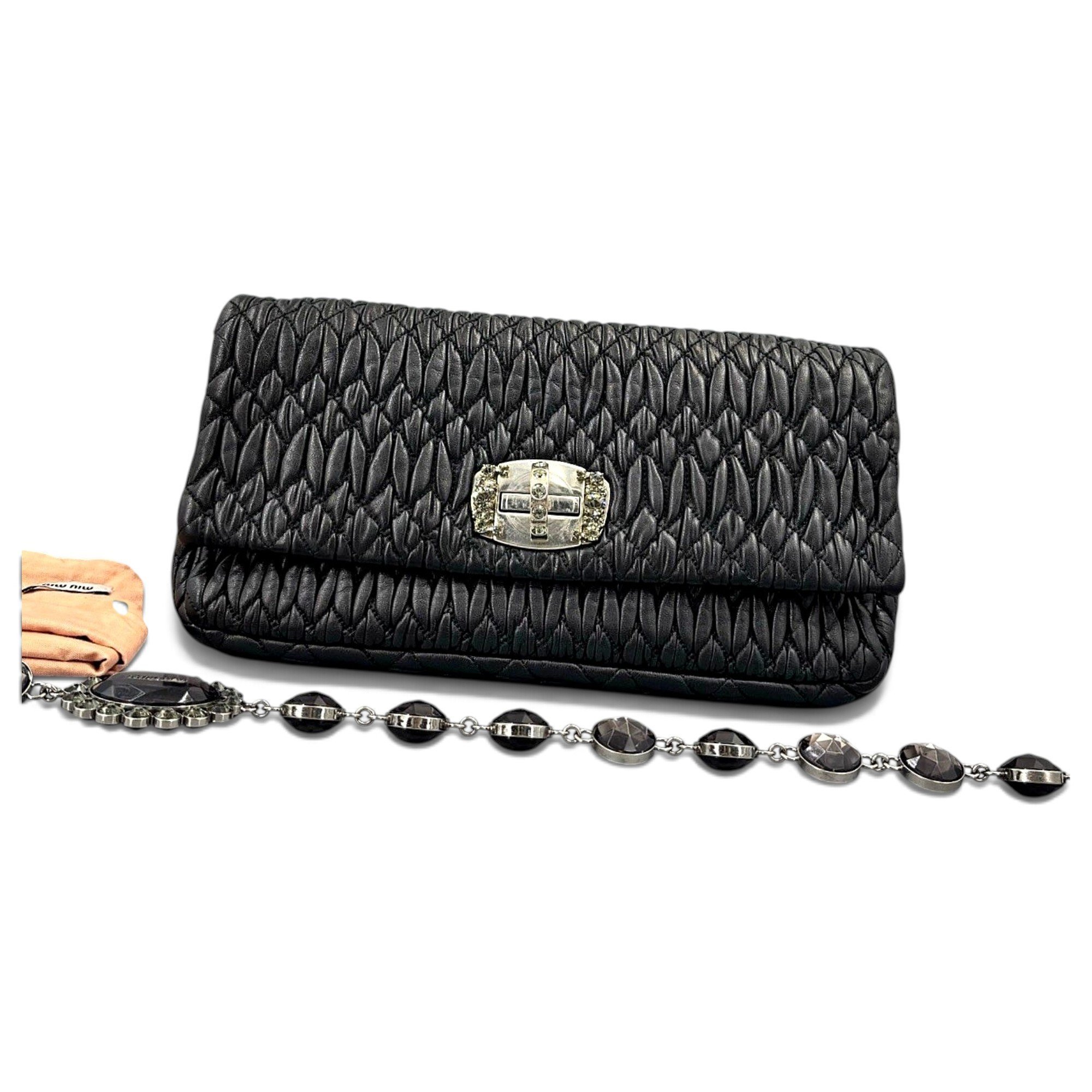Miu Crystal leather clutch bag