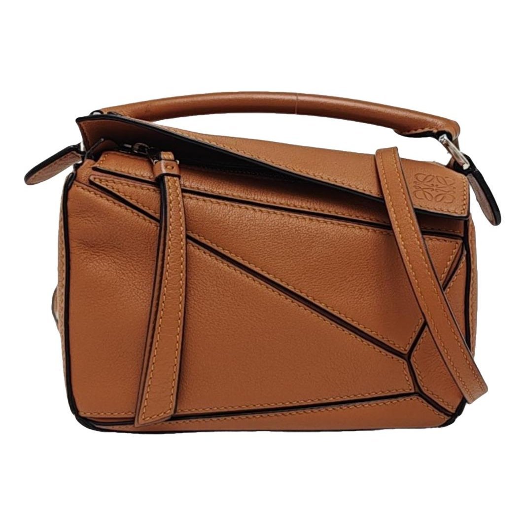 Puzzle leather handbag