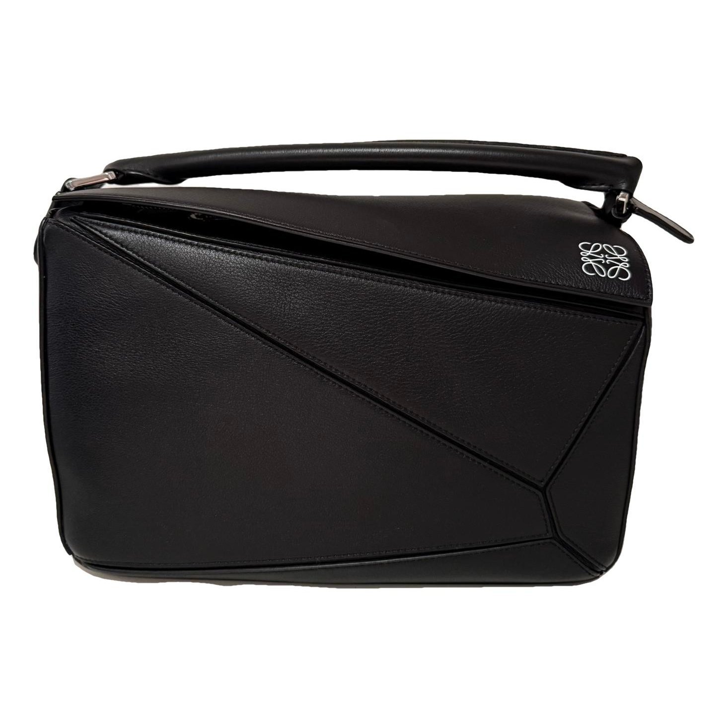 Puzzle leather handbag