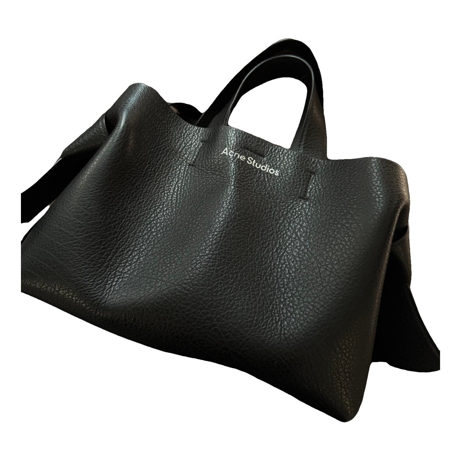 Musubi leather handbag