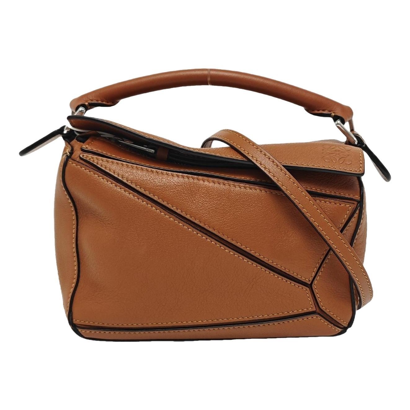 Puzzle leather handbag