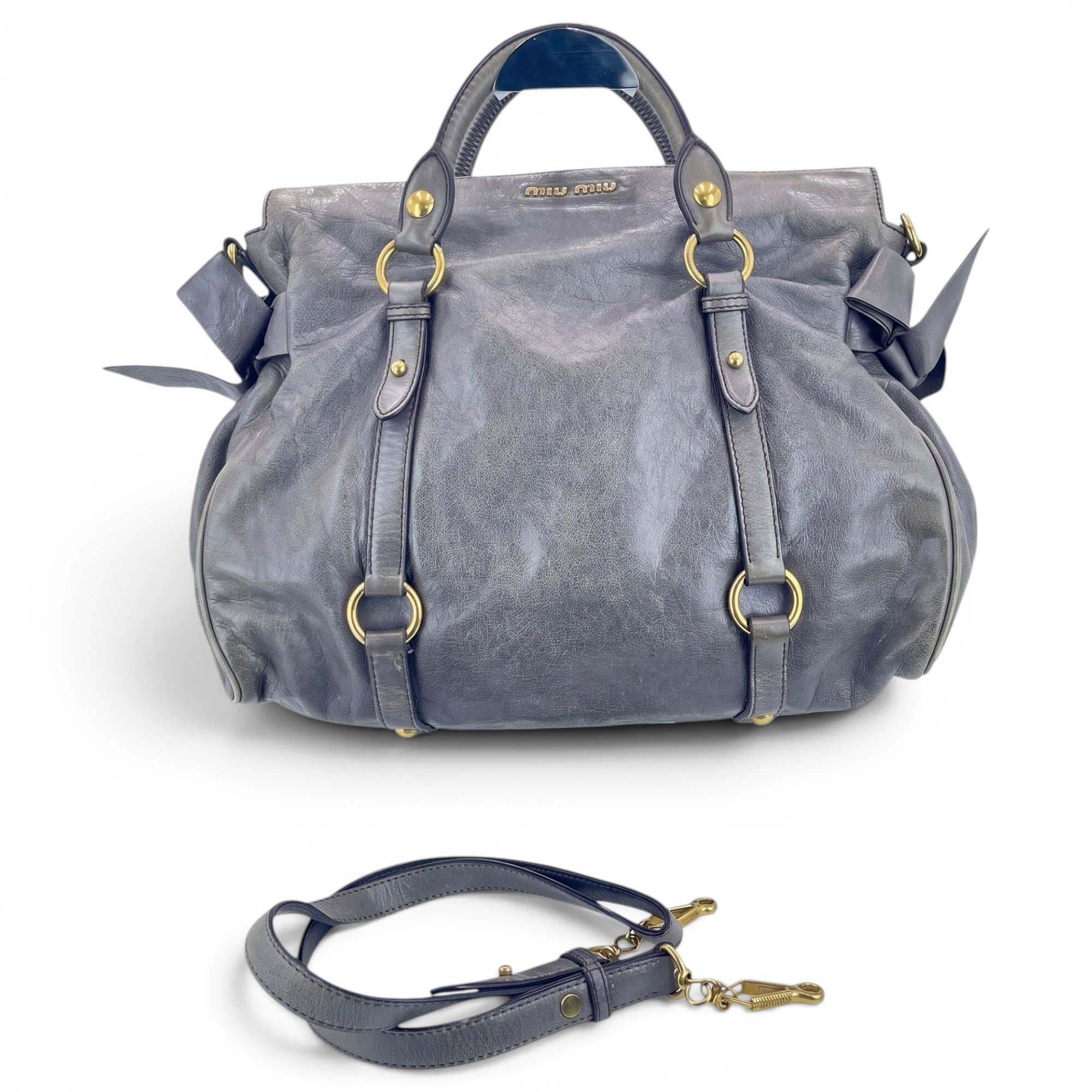 Bow bag leather handbag