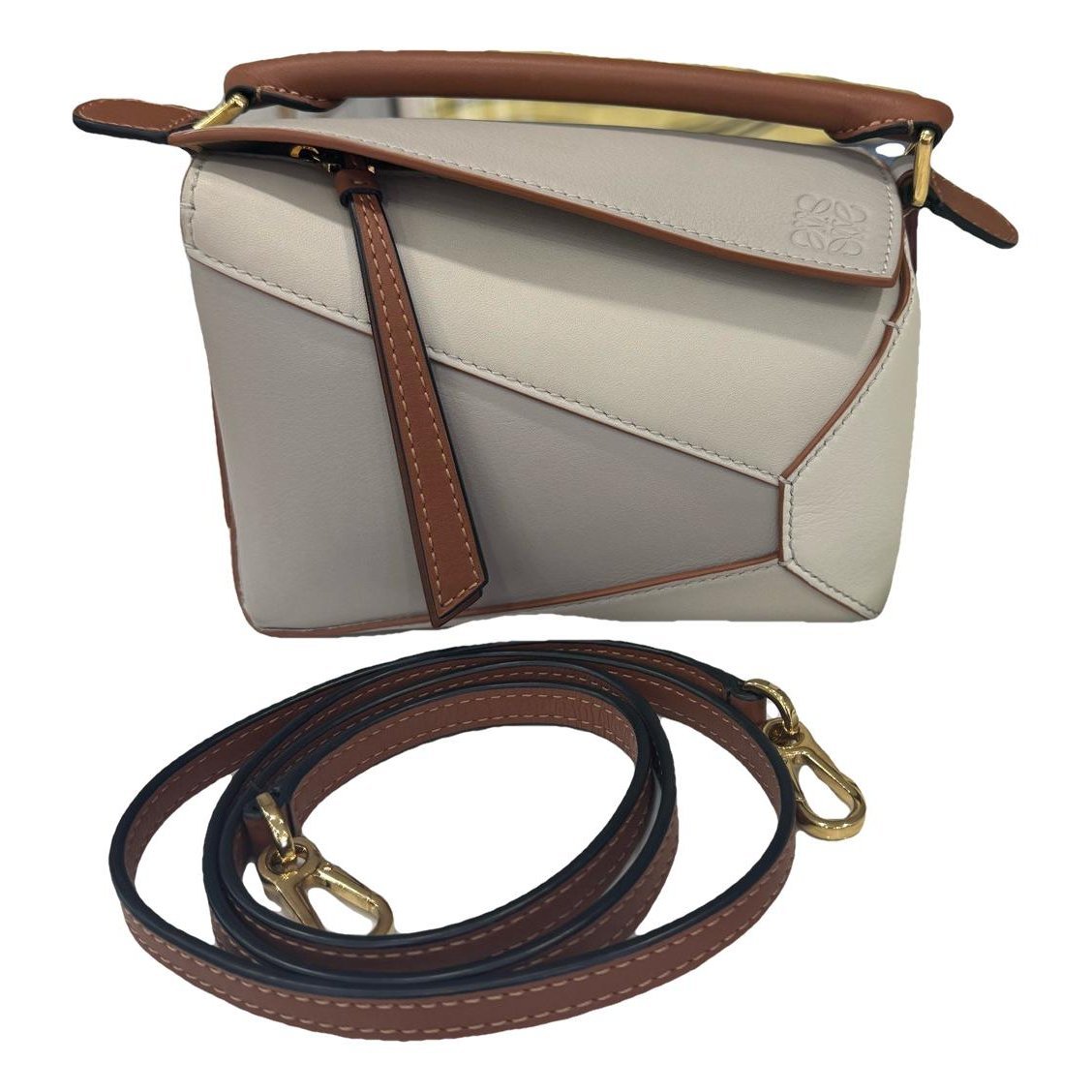 Puzzle leather handbag
