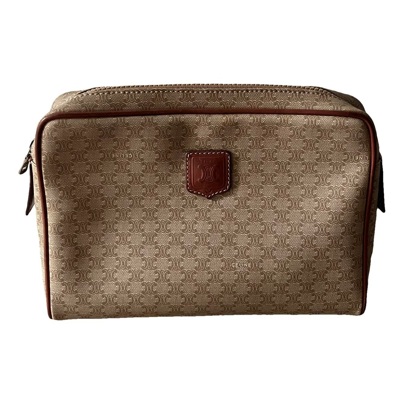 Triomphe Vintage cloth clutch bag