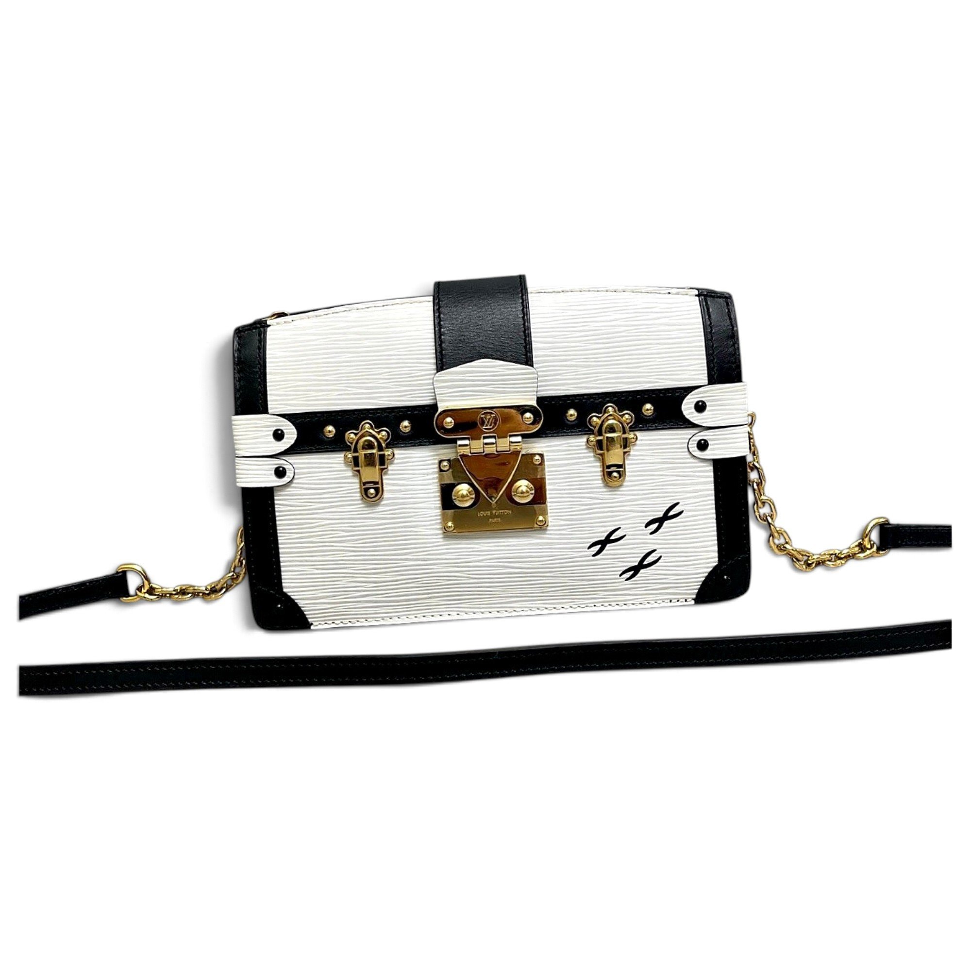 Pochette Trunk leather handbag
