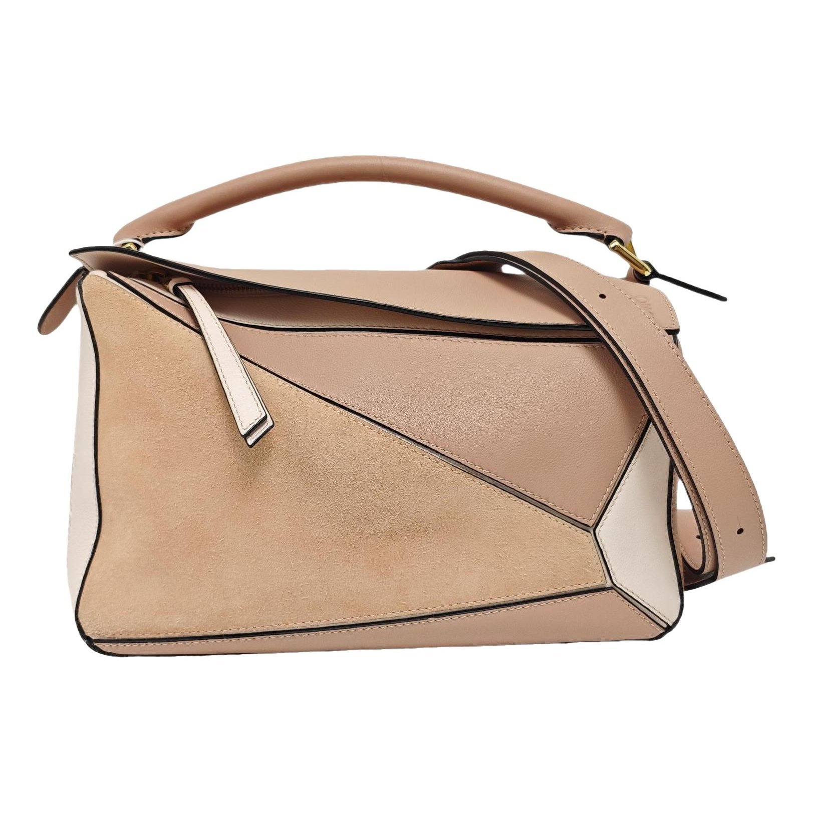 Puzzle leather handbag
