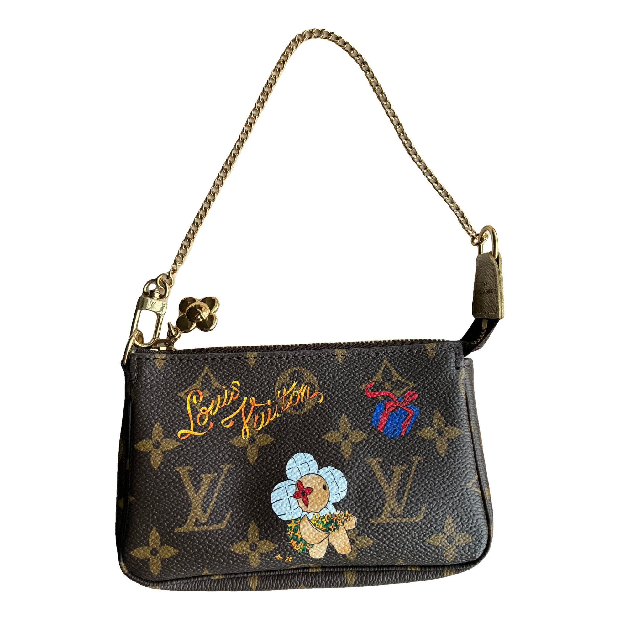 Pochette Accessoire cloth handbag