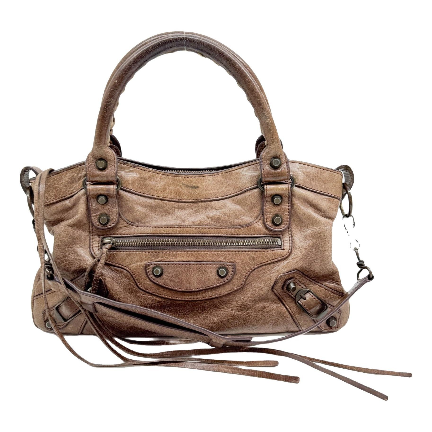First leather handbag