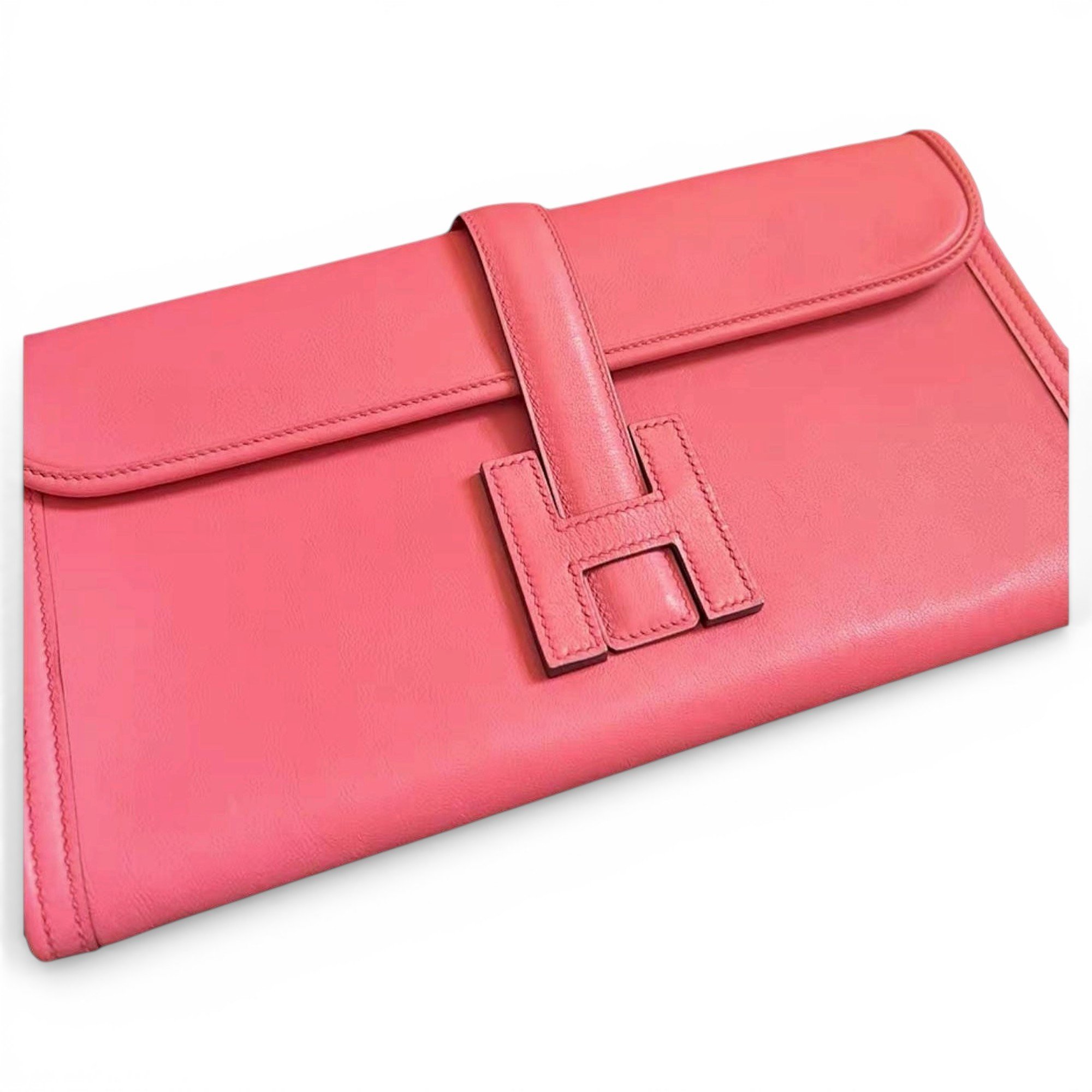 Jige leather clutch bag