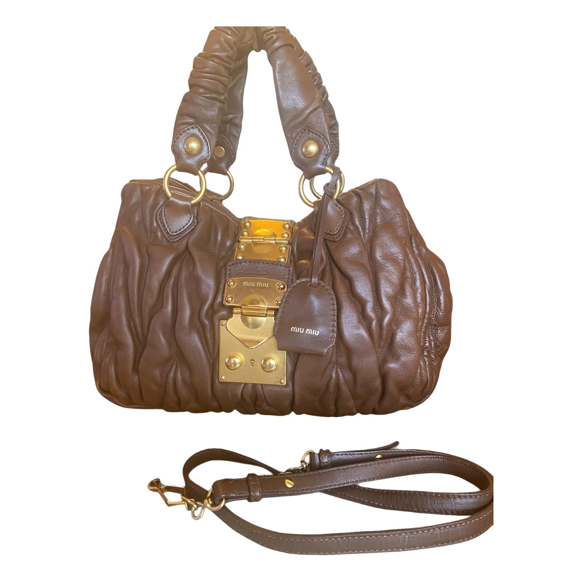 Coffer leather handbag