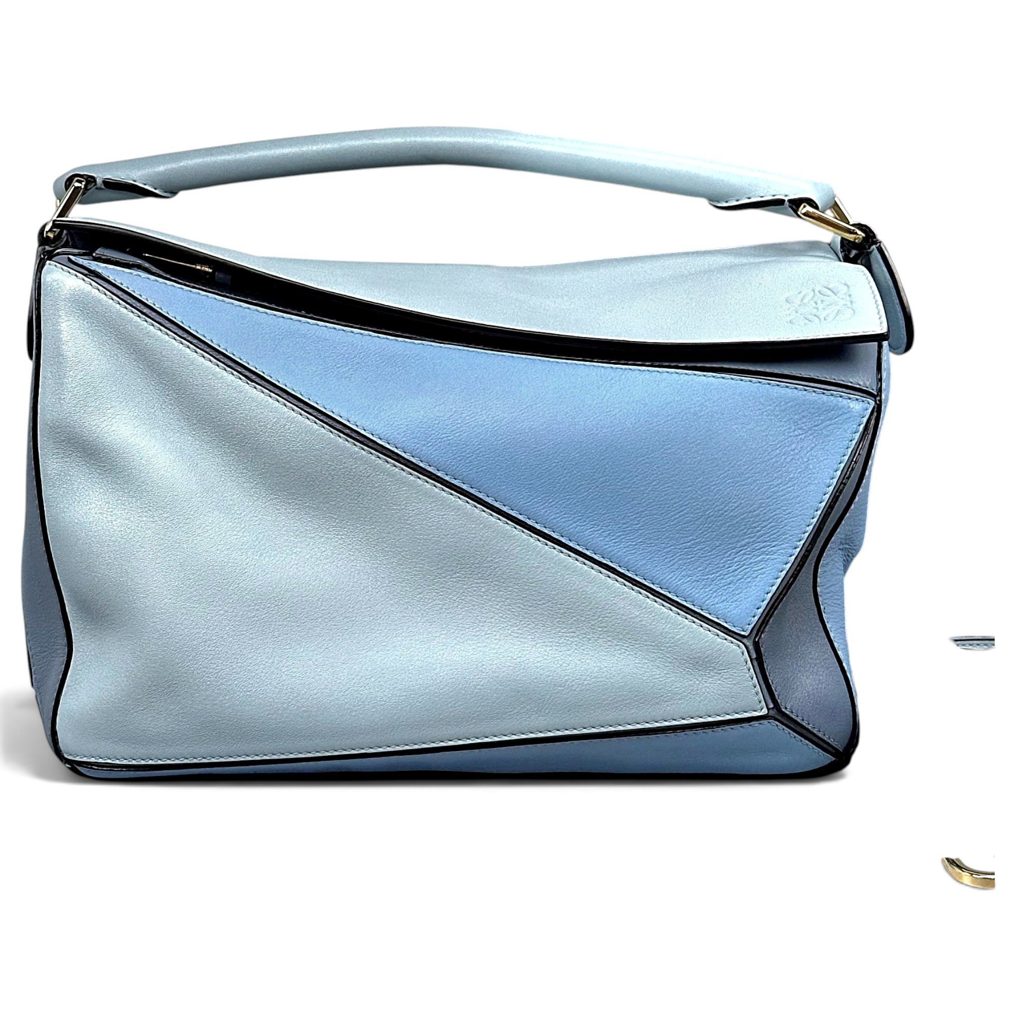 Puzzle leather handbag