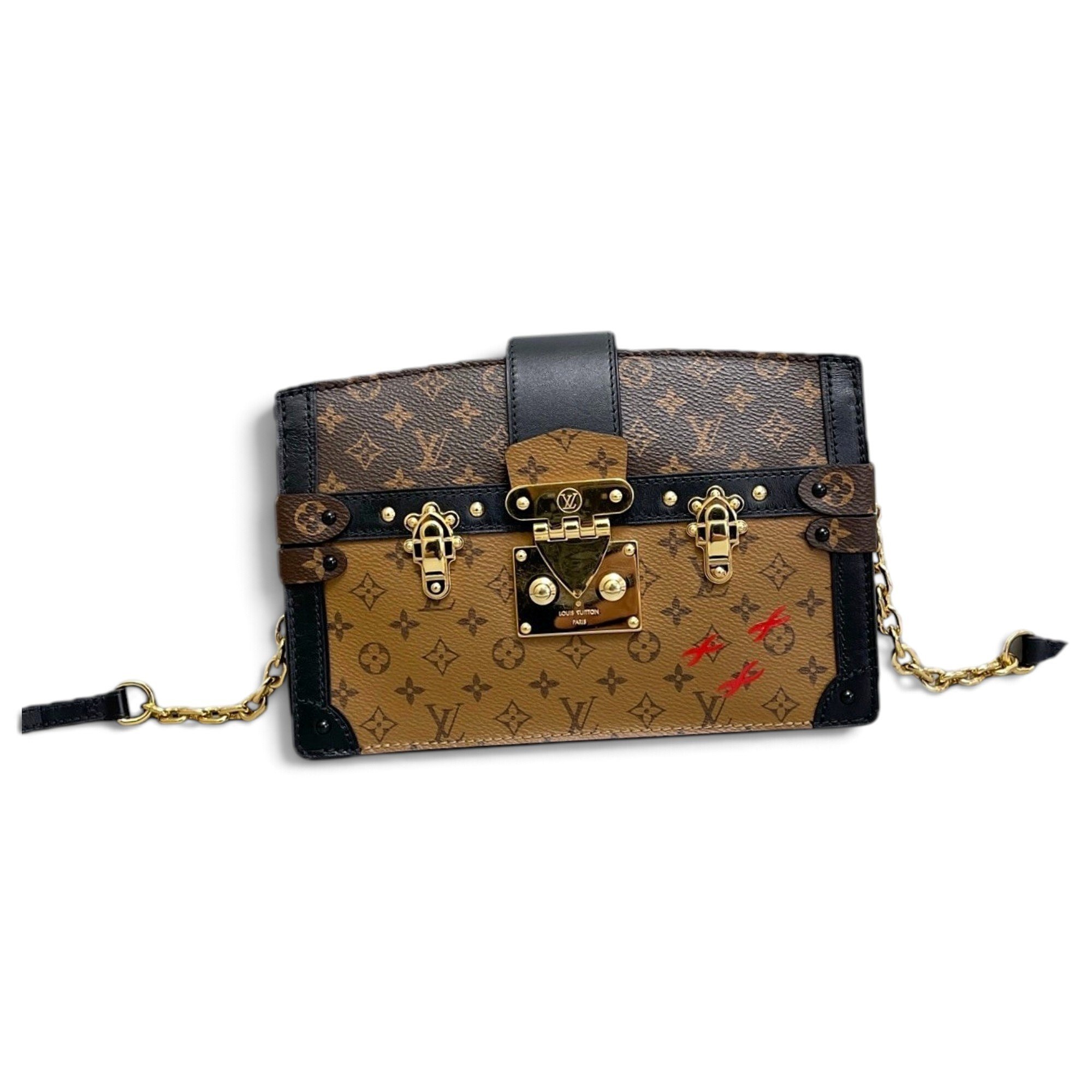 Pochette Trunk leather handbag
