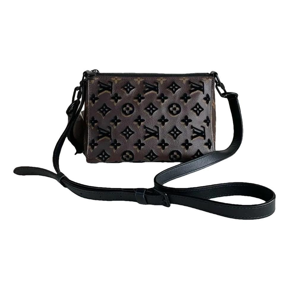 Triangle vinyl crossbody bag