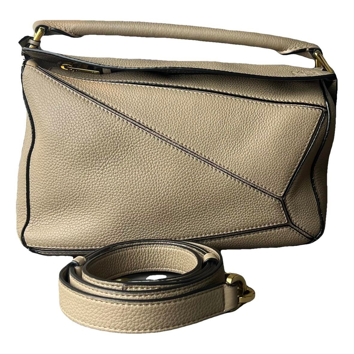 Puzzle leather handbag