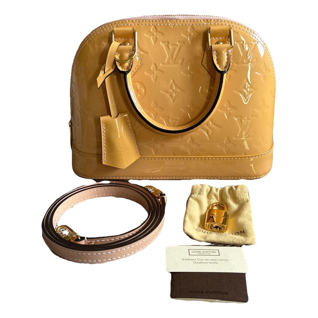 Alma BB patent leather handbag