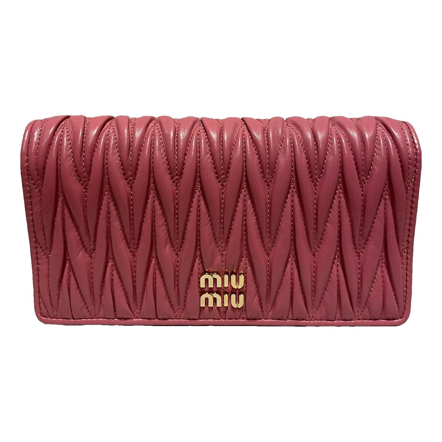 Matelassé leather clutch bag