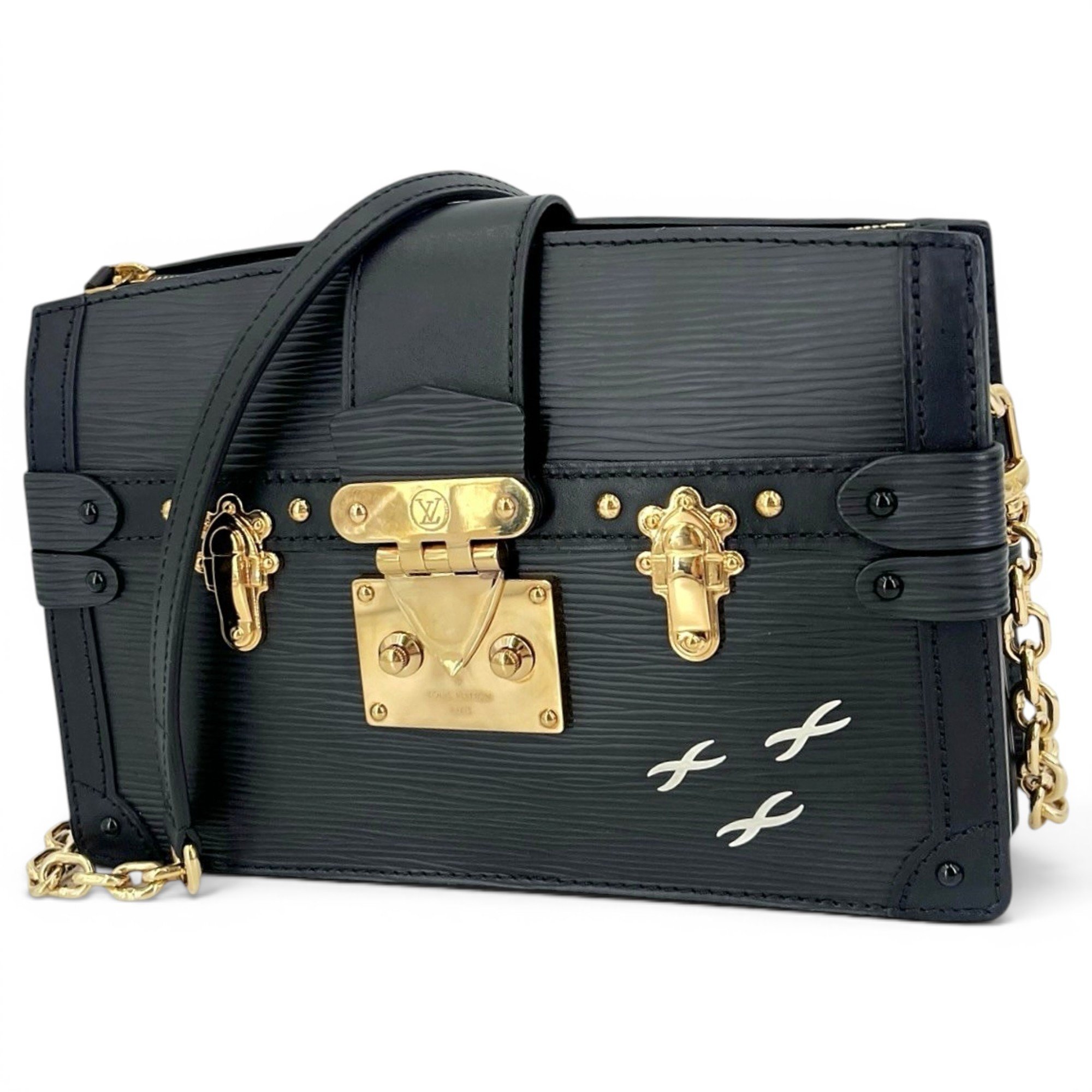 Pochette Trunk leather handbag