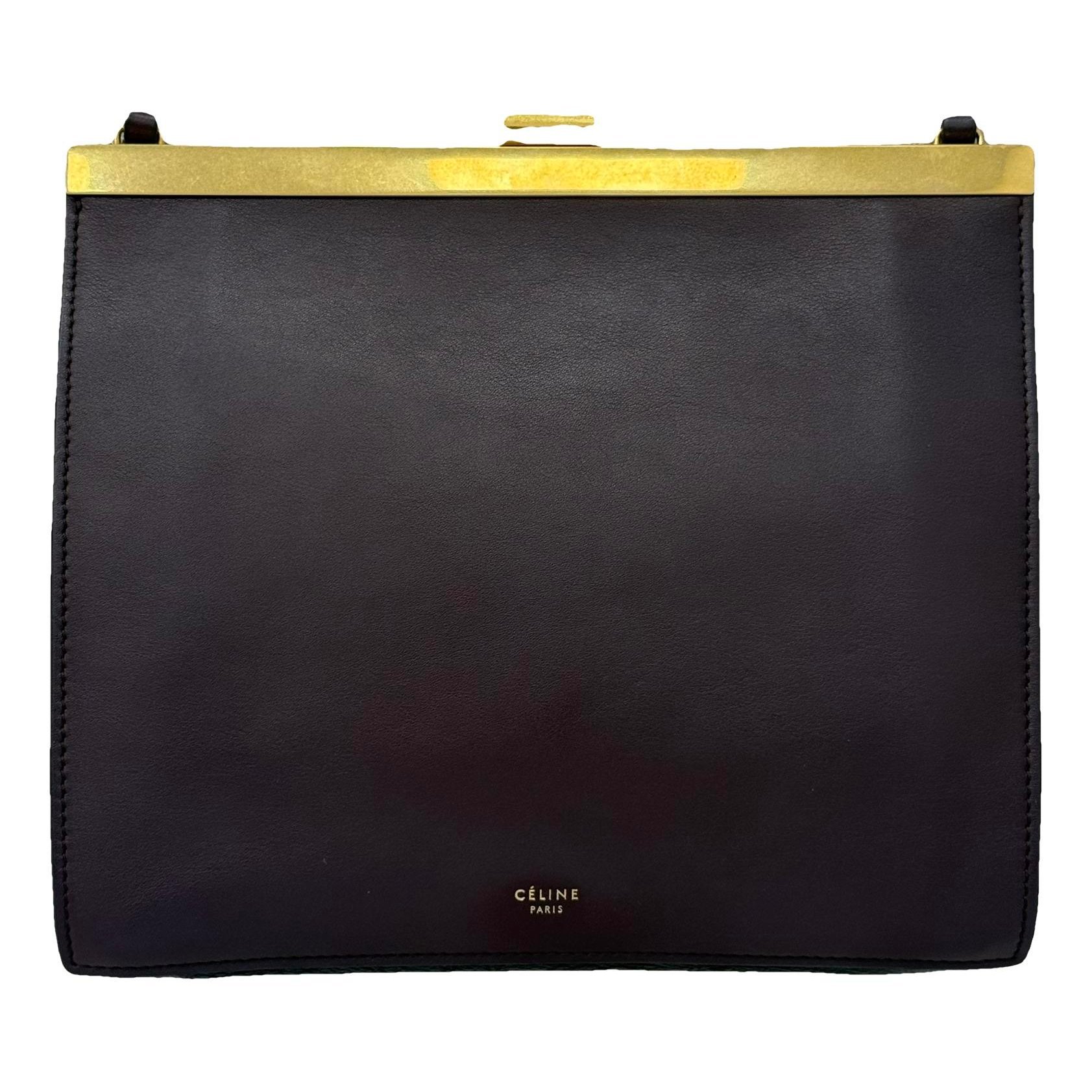 Clasp leather handbag