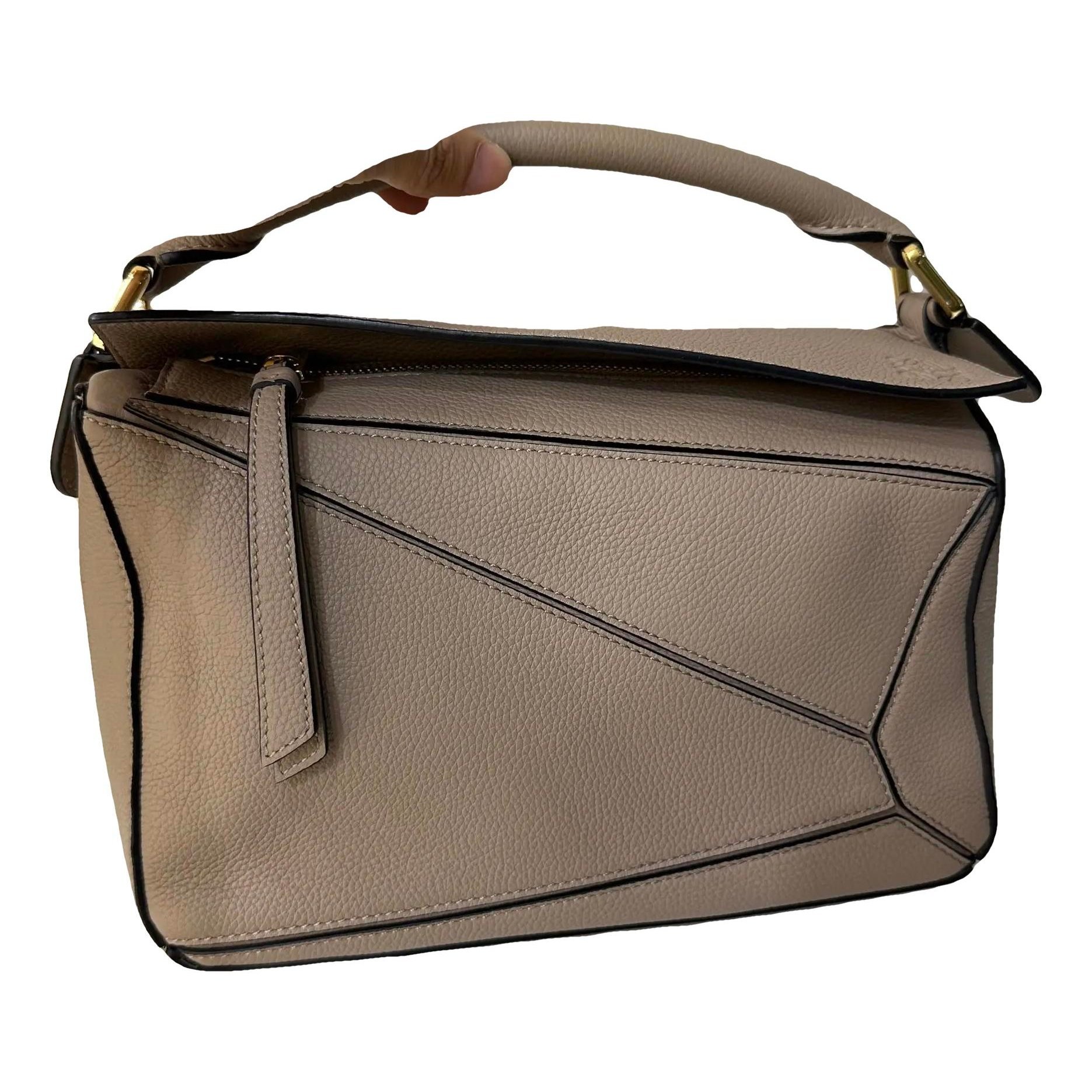 Puzzle leather handbag