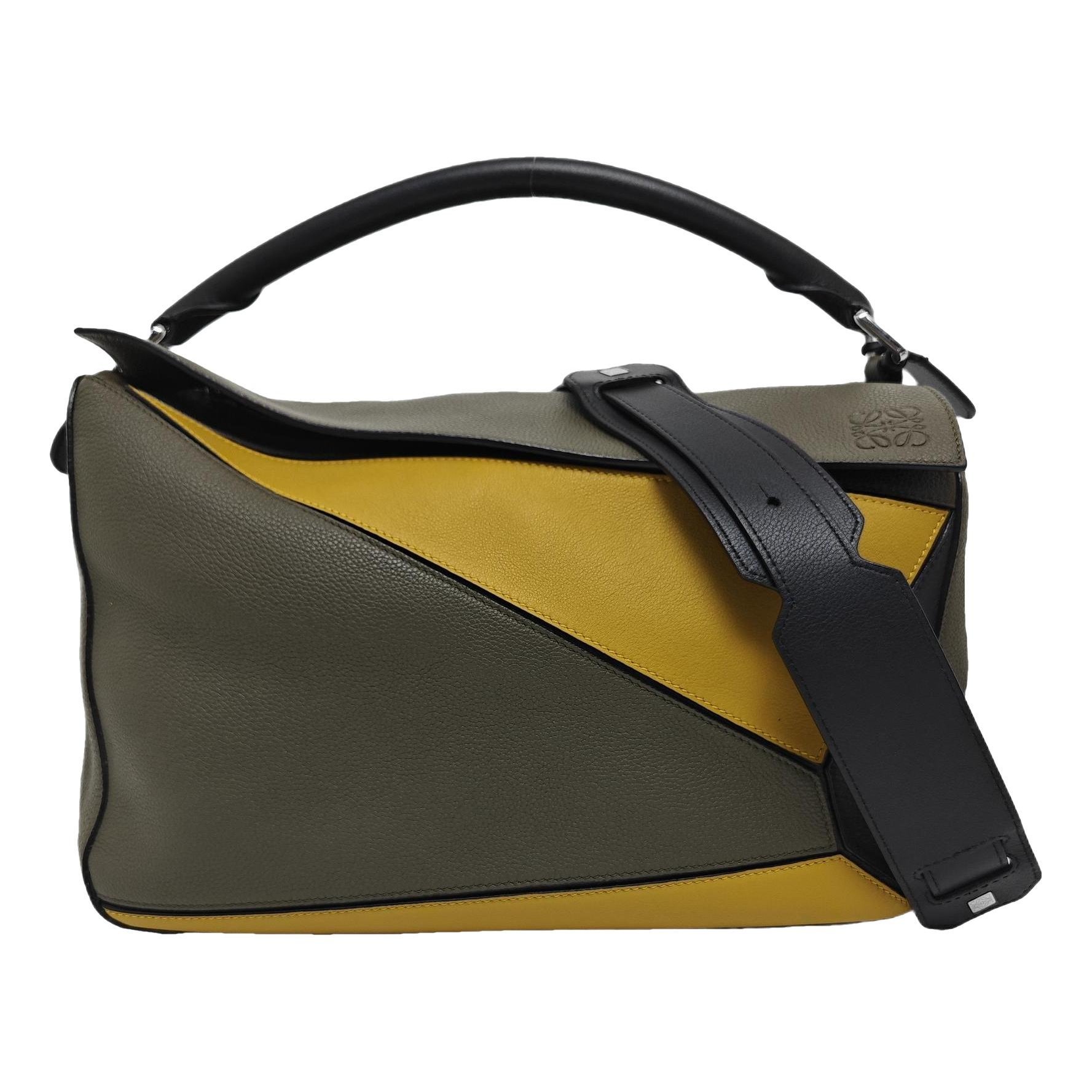 Puzzle leather handbag