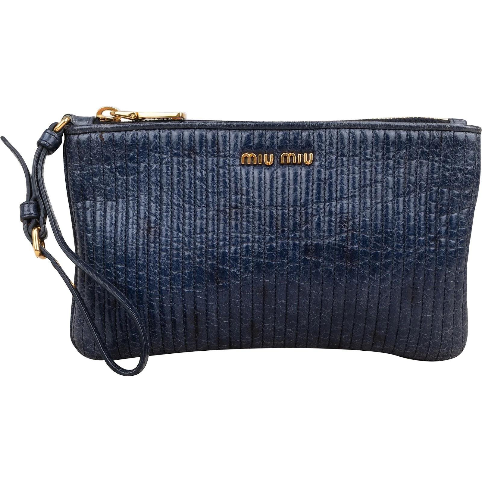 Matelassé leather clutch bag