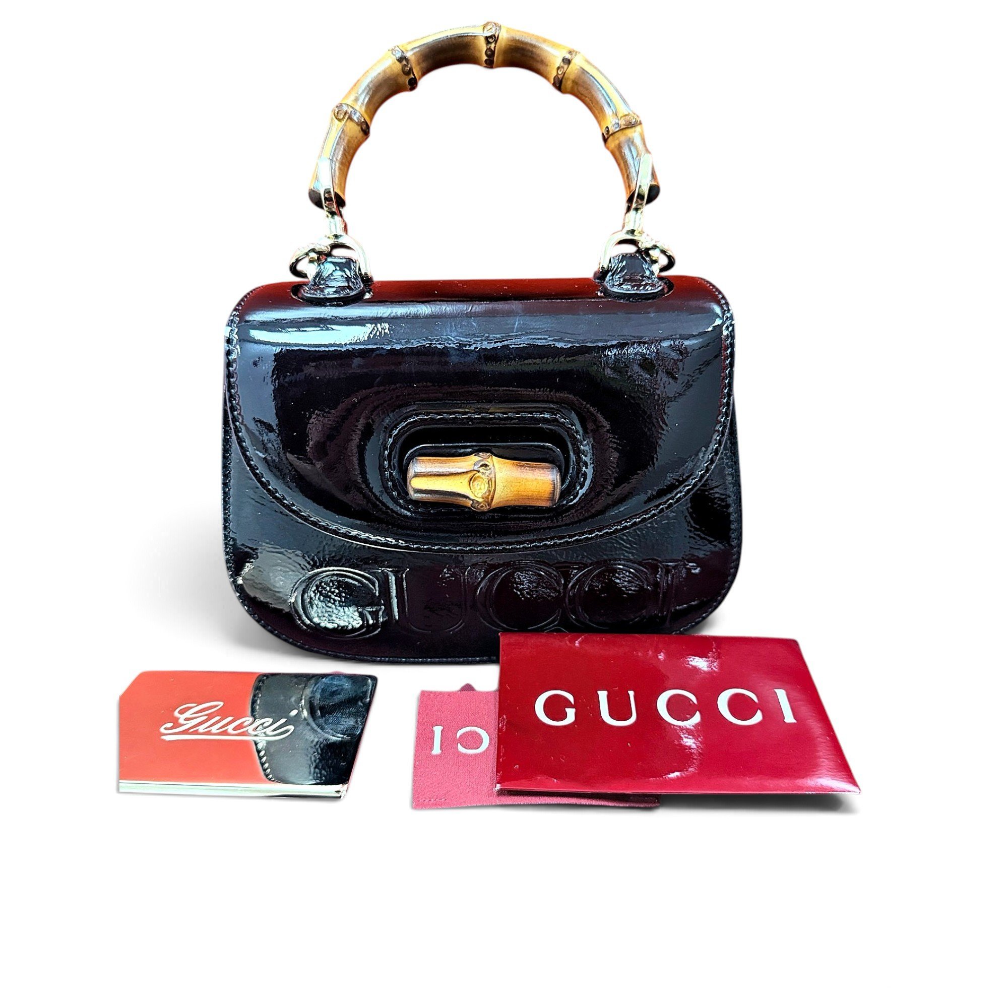 Bamboo patent leather handbag