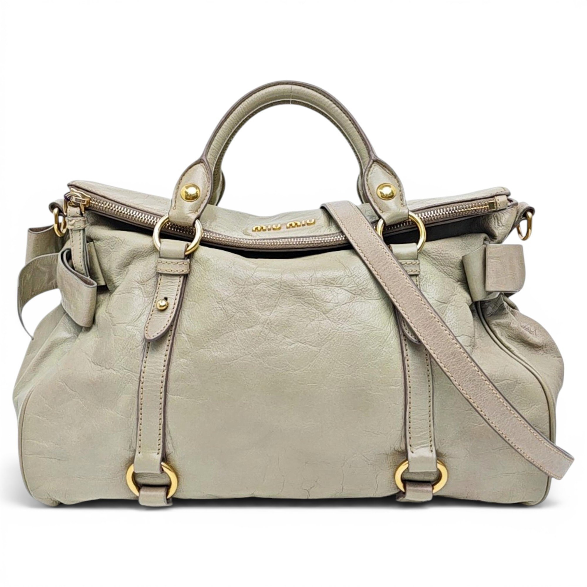 Bow bag leather handbag
