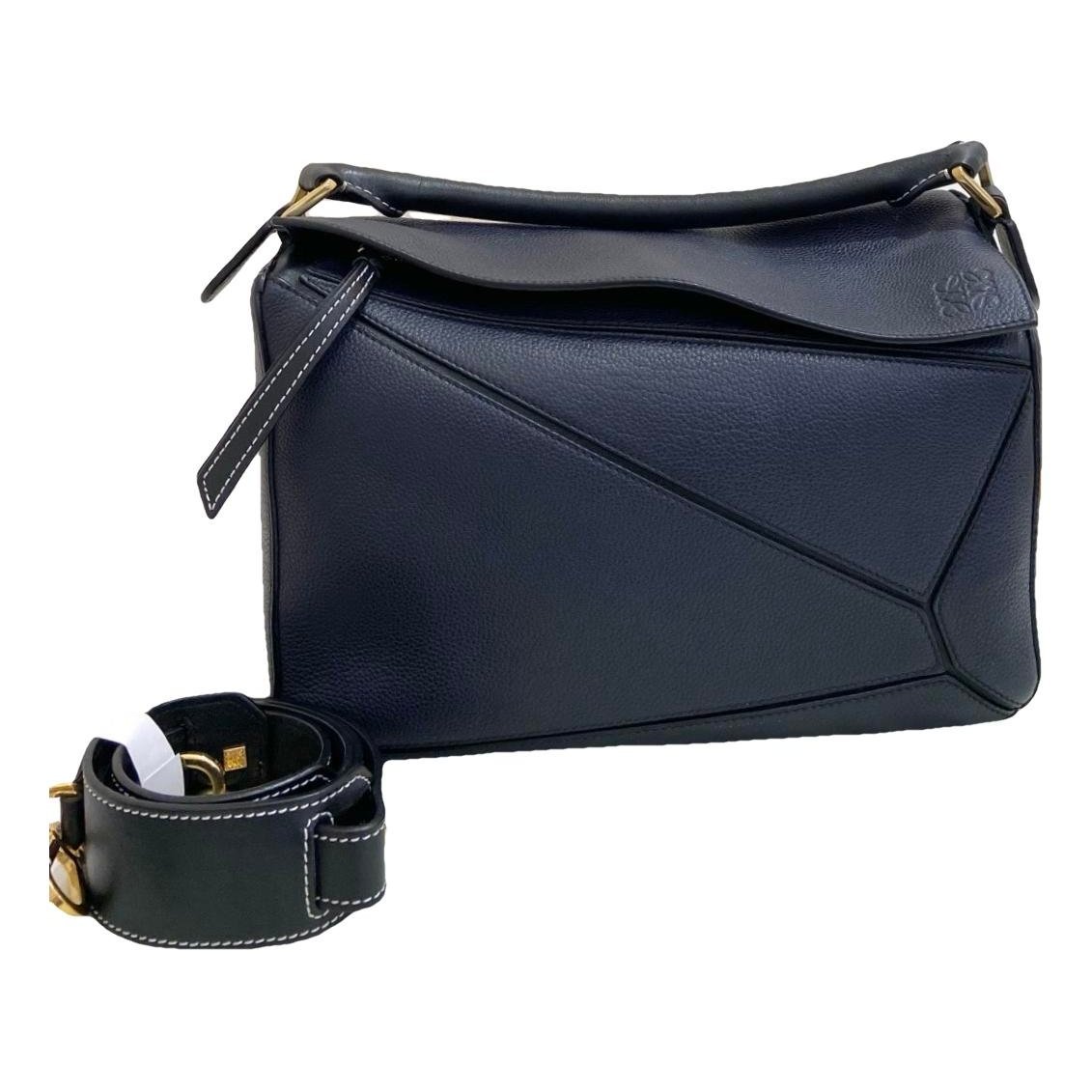 Puzzle leather handbag