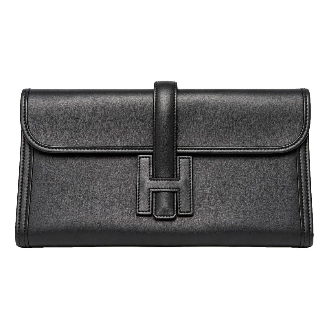 Jige leather clutch bag