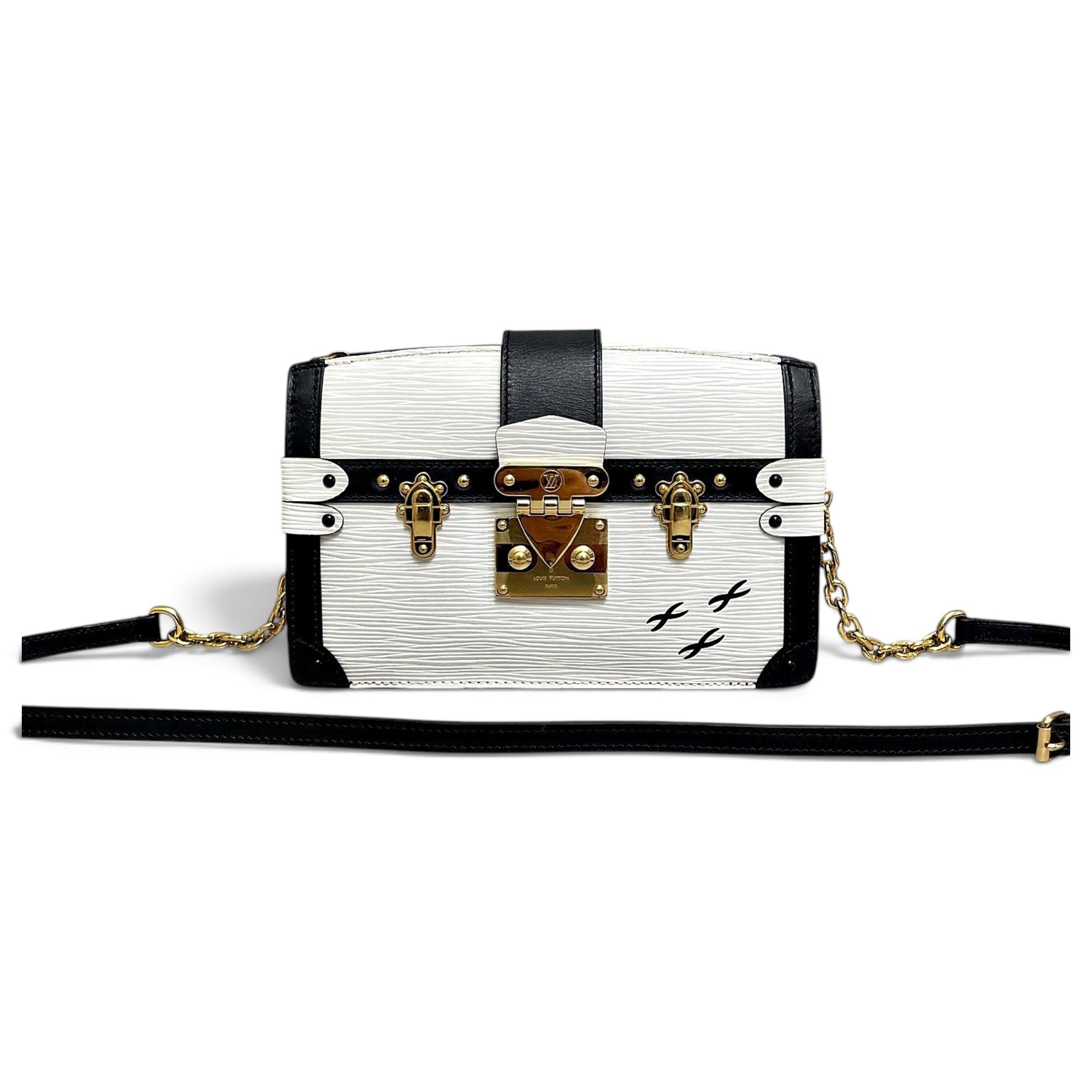 Pochette Trunk leather handbag