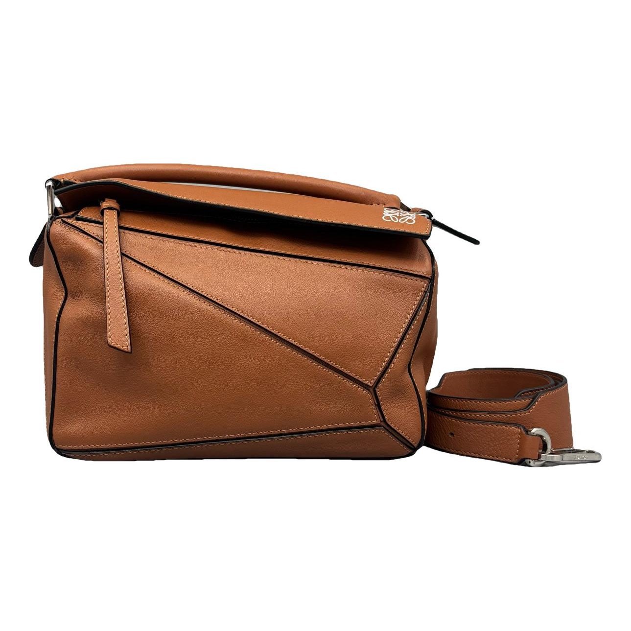 Puzzle leather handbag