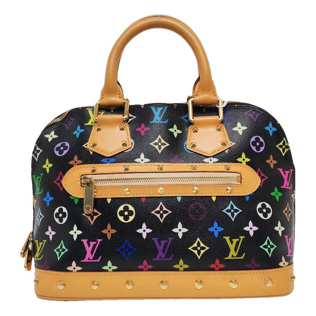 Louis Vuitton Alma BB cloth handbag