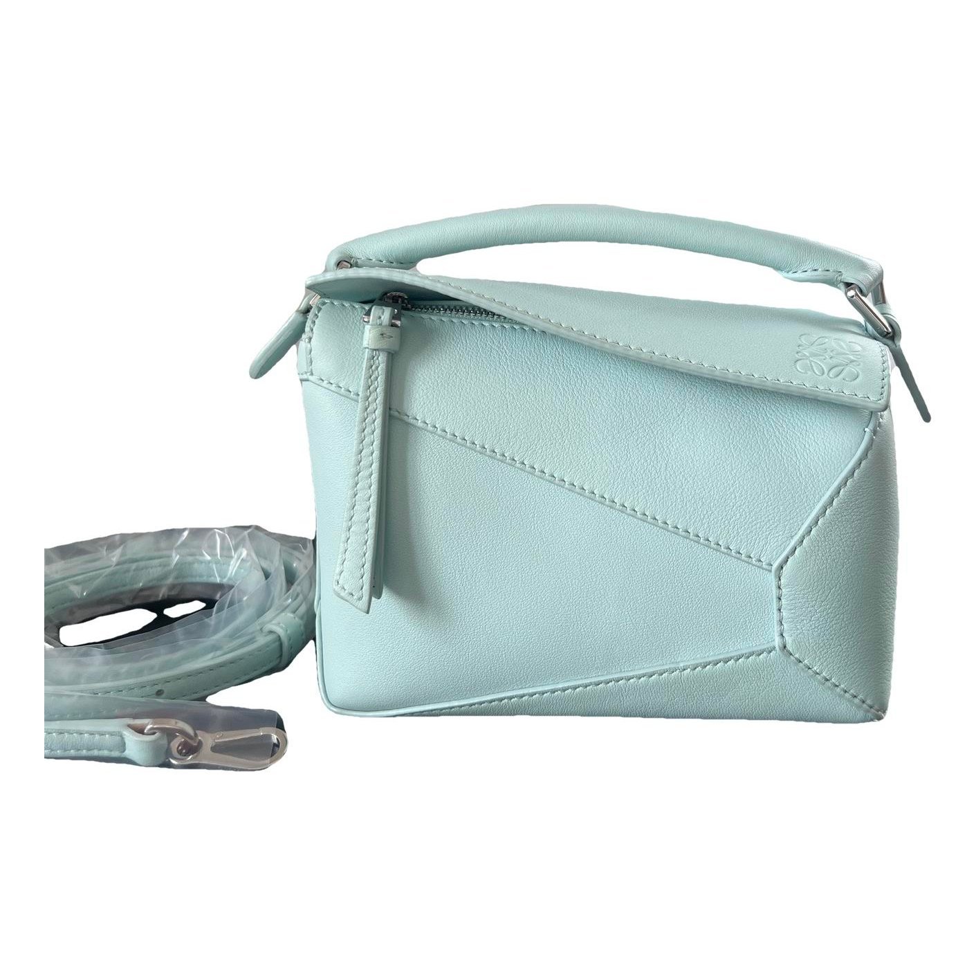Puzzle leather handbag