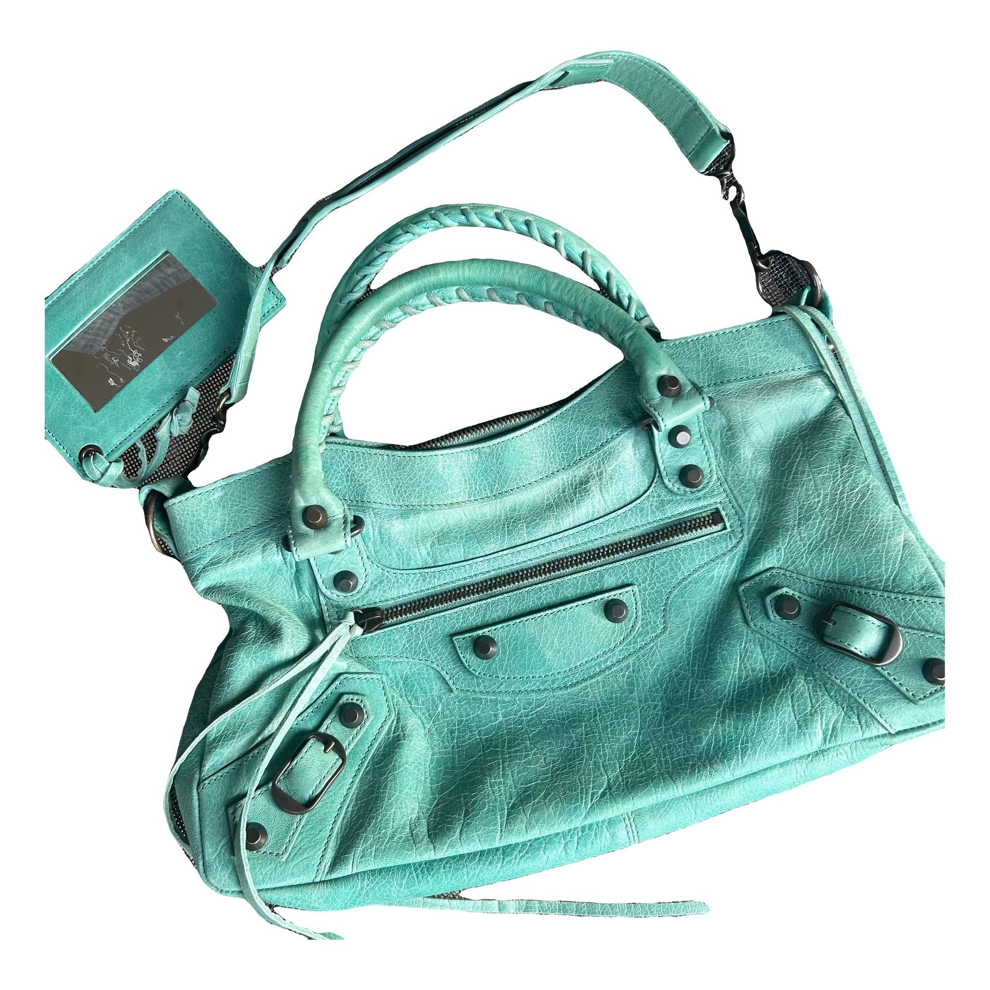 First leather handbag