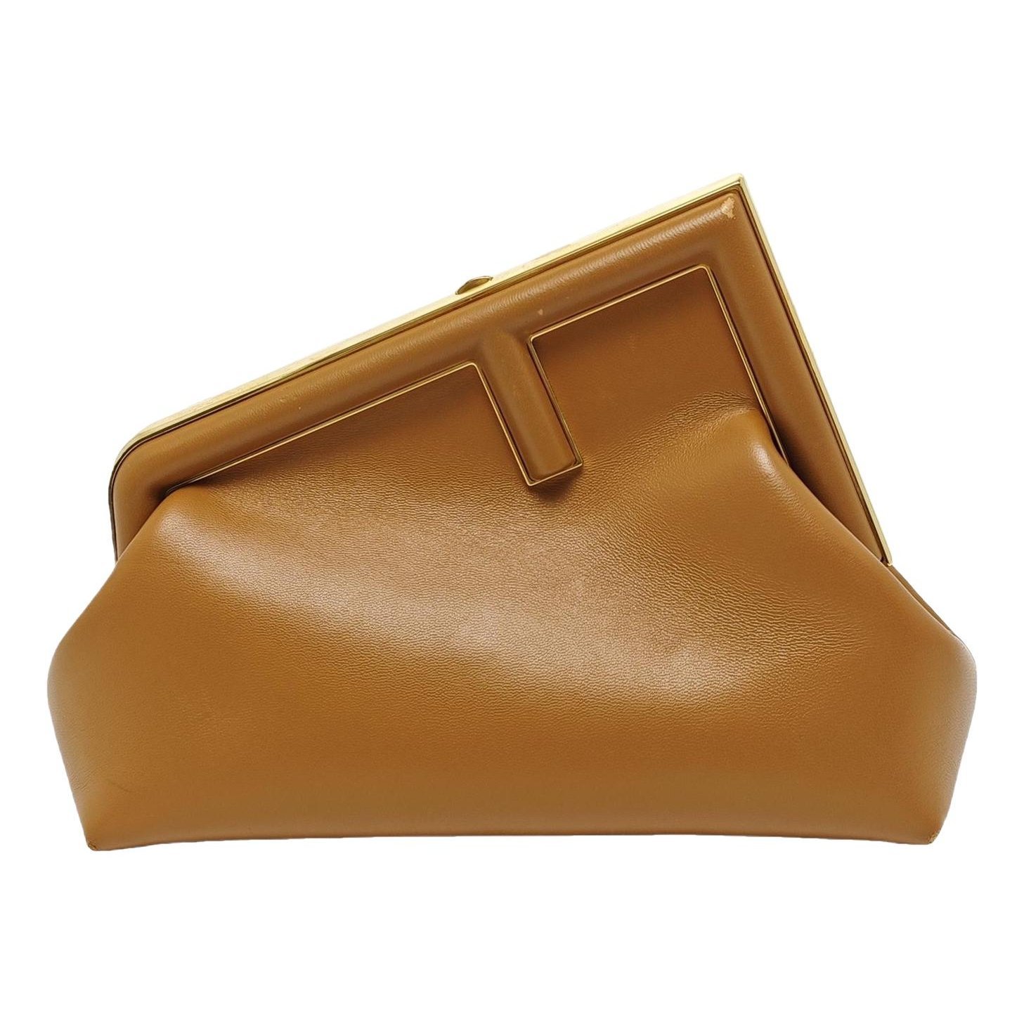 First leather handbag